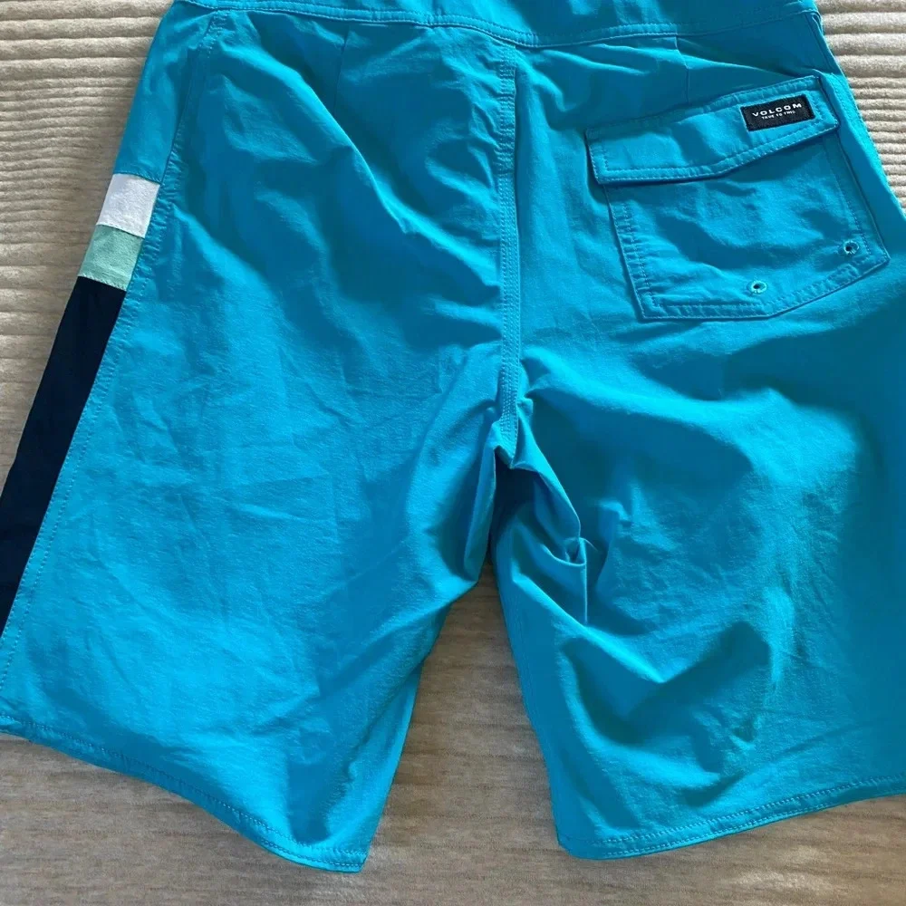 Volcom Boys Board Shorts Swim Suit Pockets Solid Blue size 20 NEW